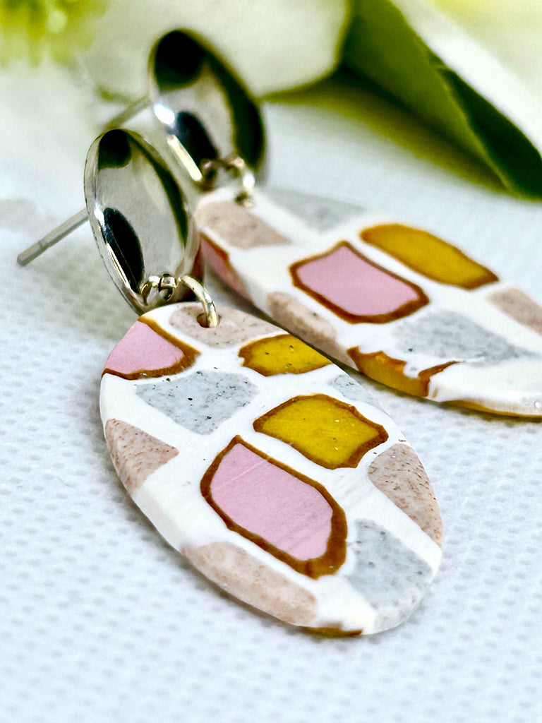 Pastel Pink Yellow Silver Patches on White Oval Polymer Clay with Round Flat Silver Studs