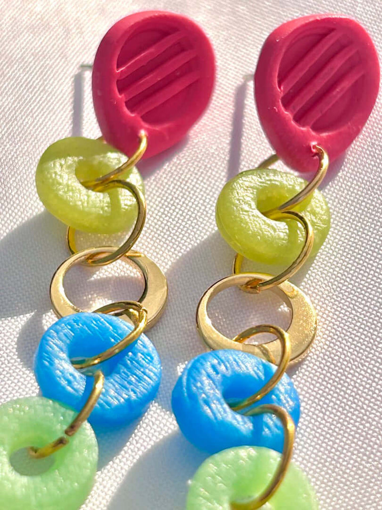 blue, green and gold loops dangling under red studs polymer clay earrings