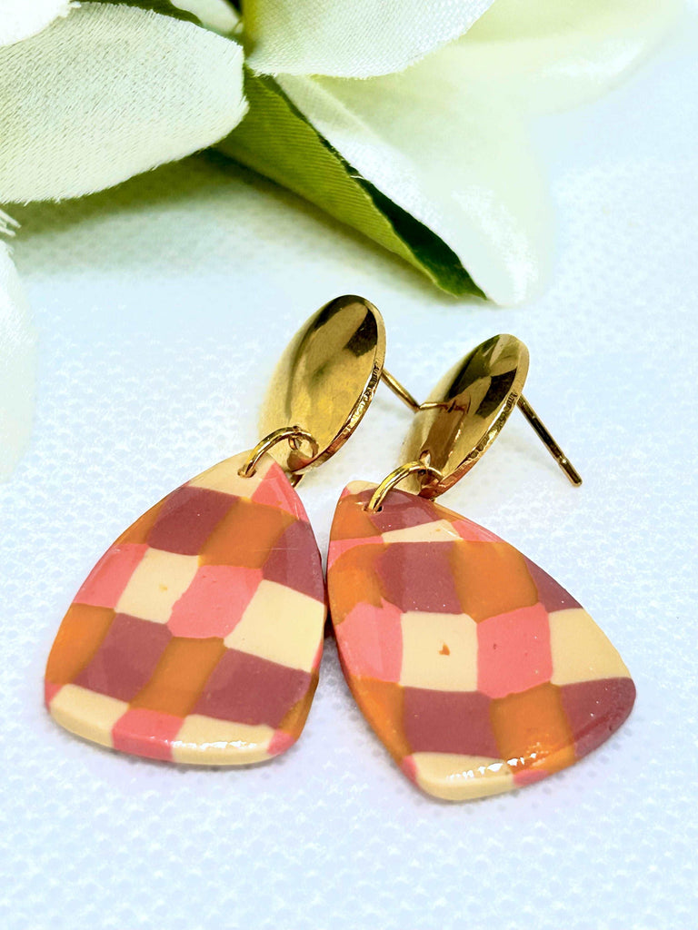 Orange and pink 1960s style polymer clay earrings with golden hardware