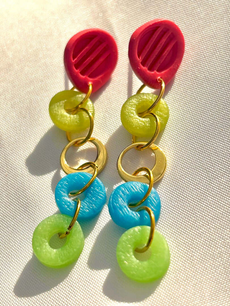 blue, green and gold loops dangling under red studs polymer clay earrings