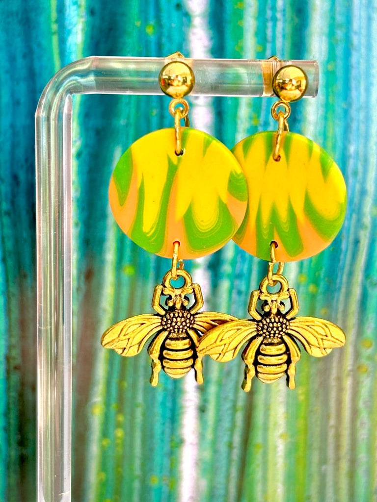 citrus swirl polymer clay earrings with gold honeybee charms